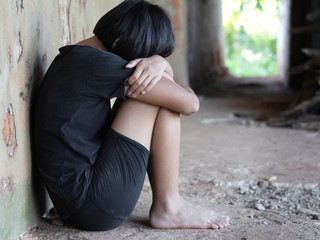 Violence and rape concept,concept photo of sexual assault,traumatized young girl