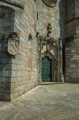 Fototapeta premium Door and stone decoration spiraling column in a Cathedral