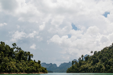Fototapeta na wymiar Ratchaprapa Dam or Cheow Larn Lake, Khao Sok national parks is one of the most beautiful locations in Thailand