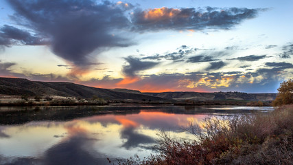 The sun sets on the Snake River at Three Island State Park, Glenn's Ferry, Idaho, USA