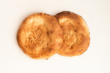 Two loafs of fresh pita bread, top view