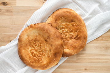 Two loafs of fresh pita bread, top view