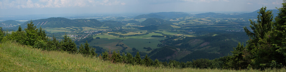 Fototapeta na wymiar Panoramic view from the summit of Velky Javornik in Beskydy in Czech republic