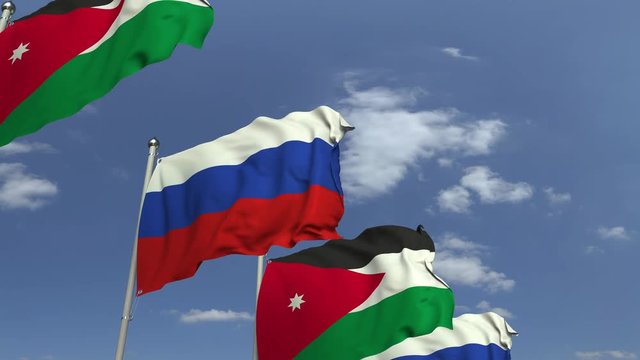 Waving flags of Jordan and Russia on sky background, loopable 3D animation