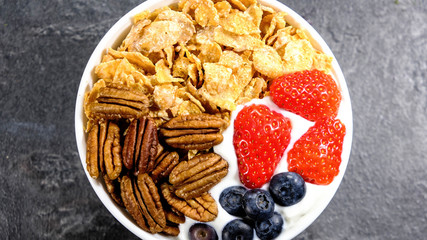 Healthy Breakfast of Cereals With Fresh Fruit and Nuts