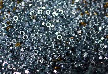 Background of screw bolts, Internal screw, nuts, many screws.  Factory equipment and Industrial concept.