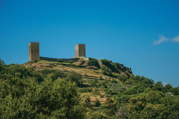 Hilly landscape with the towers of castle