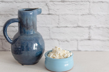 fresh cottage cheese and milk jug