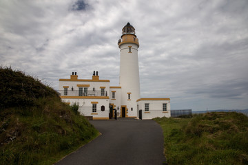 Fototapeta na wymiar Lighthouse at Turnberry Scotland on an Overcast Day
