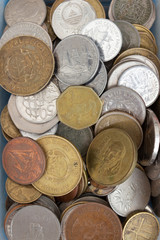 Old coins close up, old European coins from different metal and different states of the 19th and 20th centuries close up, background.
