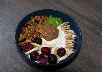 Cottage cheese with muesli, fruits and berries