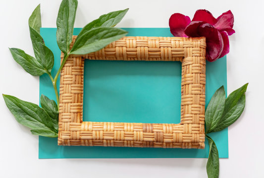 the layout of the frame with peonies on blue background