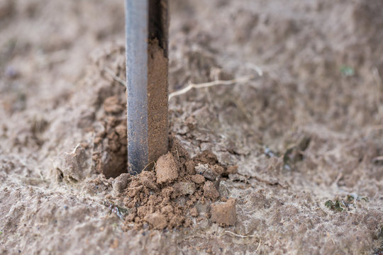 Soil Sampling. Automated probe for soil samples taking sample with soil probe sampler. Environmental protection, organic soil certification, research.