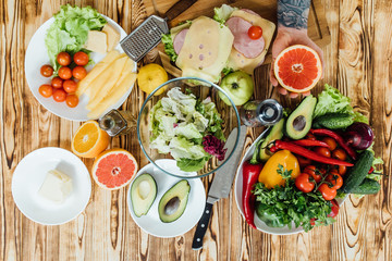 Photo of vegetables ingredients for tasty diet cooking, gray stone background , top view, copy space.