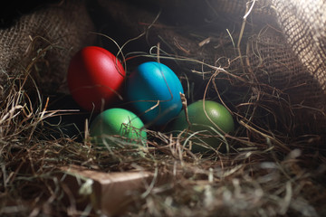 Easter painted eggs on burlap