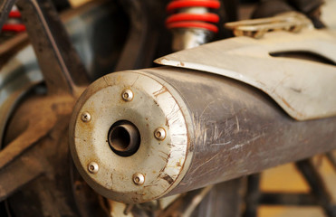 Closeup of exhaust pipe or silencer of a two wheeler motor cycle  