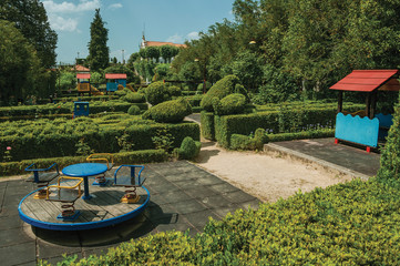 Leafy bushes in a garden and playground