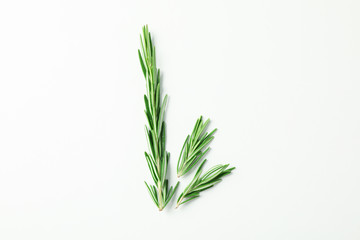 Flat lay composition with rosemary on white background, space for text