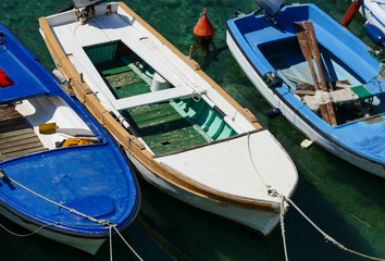 Fototapeta na wymiar Colorful old fisherman boats on the harbor