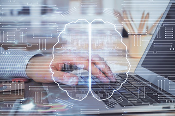 Man typing on keyboard background with brain hologram. Concept of big Data. Double exposure.