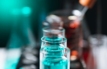 Glass laboratory chemical test tubes with liquid for analytical , medical, pharmaceutical and scientific research concept.