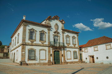 Mansion facade in baroque style on a deserted square