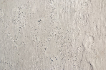 Abstract background. The surface of the white limestone wall with texture and roughness