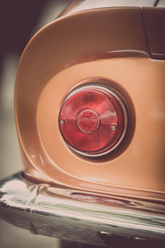 Red tail light of a classical vintage car