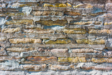 Naklejka premium Old brick wall taken in the city of Khiva, Uzbekistan