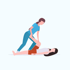 female personal trainer doing stretching exercises with girl fitness instructor helping woman to stretch muscles workout concept flat full length