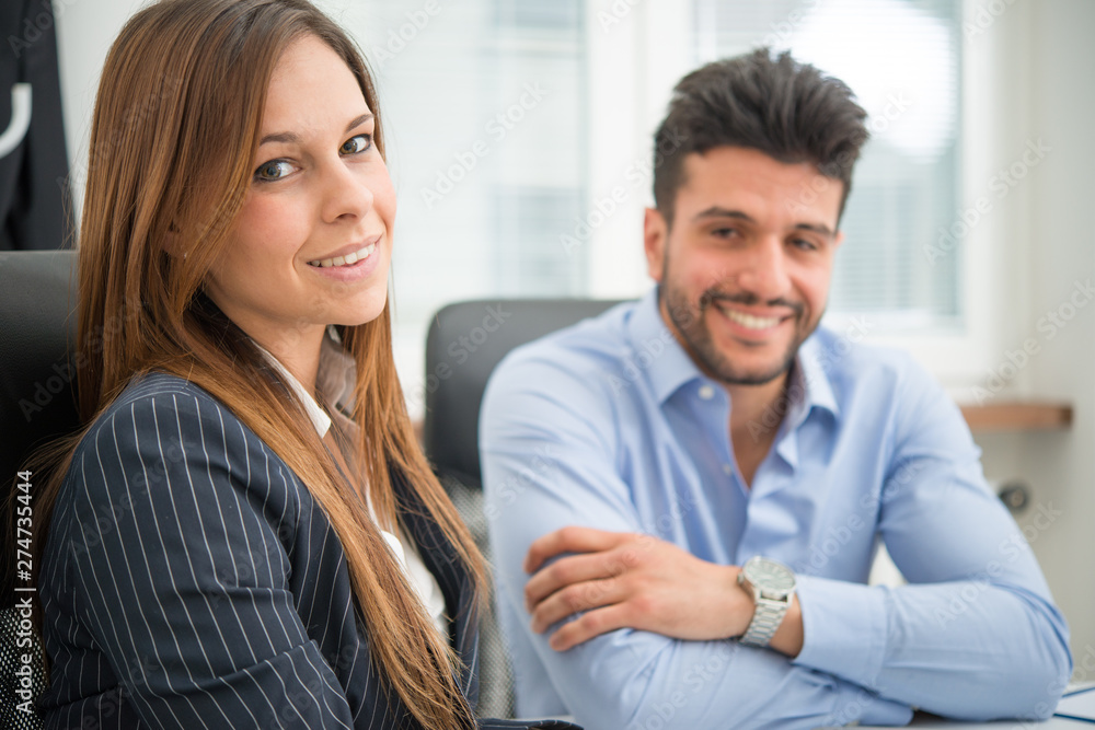 Wall mural portrait of young business people in their office