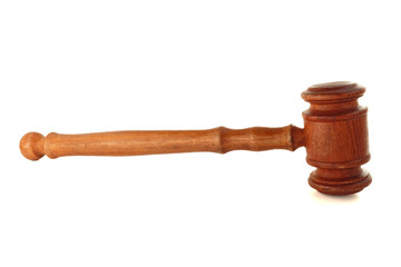Wooden judge's hammer isolated on white background