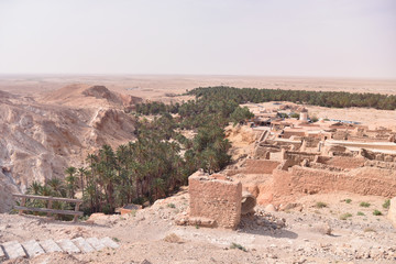 CHEBIKA, TN - JULY, 2019: Chebika Oasis lies at the foot of the mountains of the Djebel el Negueb and it is known as Qasr el-Shams (Castle of the Sun in Arabic).