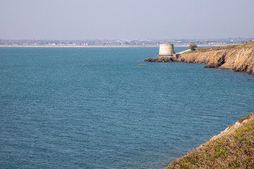 Cliffs and Martello tower in Howth