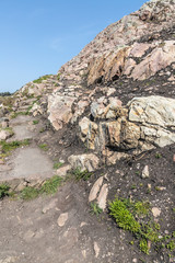 Hiking rocky trail in Howth