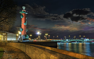 Night panorama with Rostral column in St. Petersburg