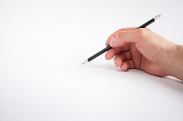 black pencil holds in his right hand. draws on a white background