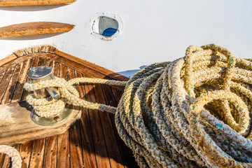 Thick ropes and different tackles on a yacht