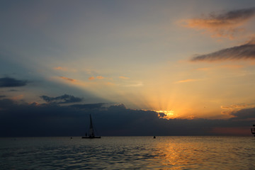 Naklejka na ściany i meble Boat at sunset in Zanzibar island