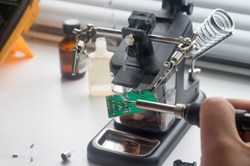 Repair of the radio board by soldering using a soldering station and other components