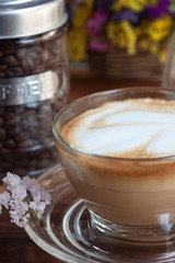 cup of coffee with milk and cookies