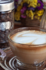 cup of coffee with cream and sugar