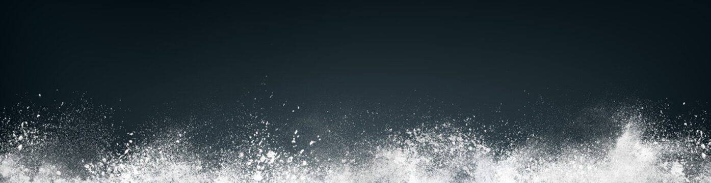 Wide design of abstract powder dust explosion over black background