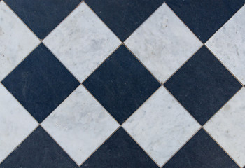 Black and white wintage checkered floor tiles.