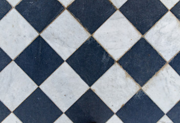 Black and white wintage checkered floor tiles.