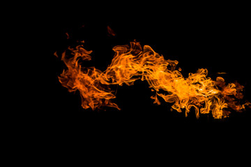 Dragon-shaped fire. Fire flames on black background. fire on black background isolated. fire patterns