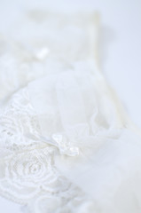 Fototapeta na wymiar Lace white background. Wedding decorations.