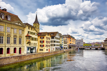 Naklejka na ściany i meble Zurich, Switzerland. View of the historic city center with famous Fraumunster Church, on the Limmat river