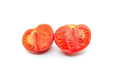 Fototapeta premium Cut red tomato on a white background