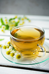 Camomile infusion in glass, natural medicine, Phytotherapy